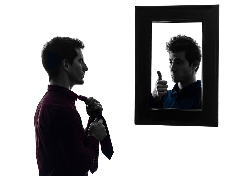 bigstock-man-in-front-of-his-mirror-ma-45742546